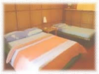 Anilao Outrigger Resort - Resort Room Bedroom View 1